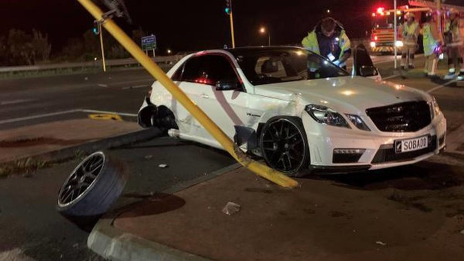 The Mercedes Benz allegedly crashed into the back of a white sedan before spinning 360 degrees and colliding with traffic. (Photo / Supplied)