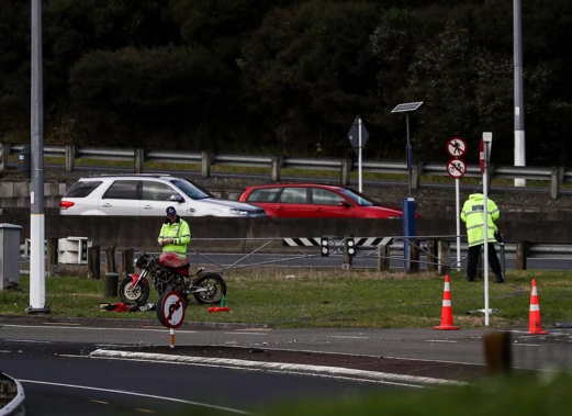 The rider died at the scene on State Highway 18 near Greenhithe. Photo / Hayden Woodward