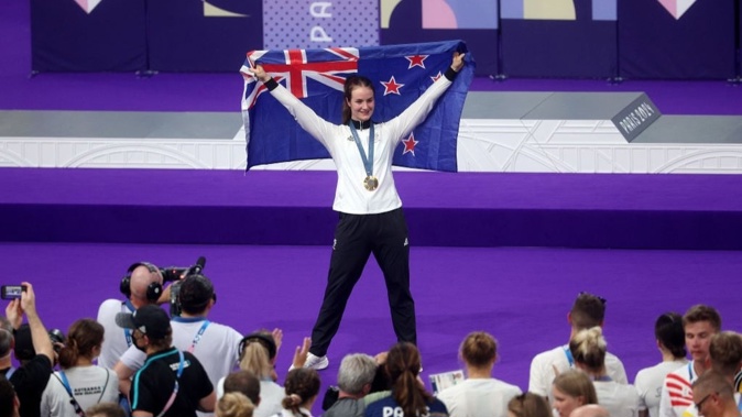 Gold medallist Ellesse Andrews of New Zealand celebrates at podium after the women's keirin final on day thirteen of the Olympic Games Paris 2024. Photo / Getty Images