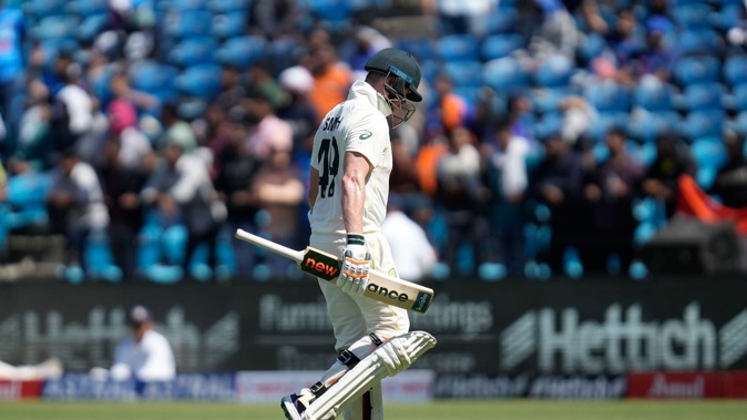 Australia's Steve Smith reacts after losing his wicket. Photo / AP
