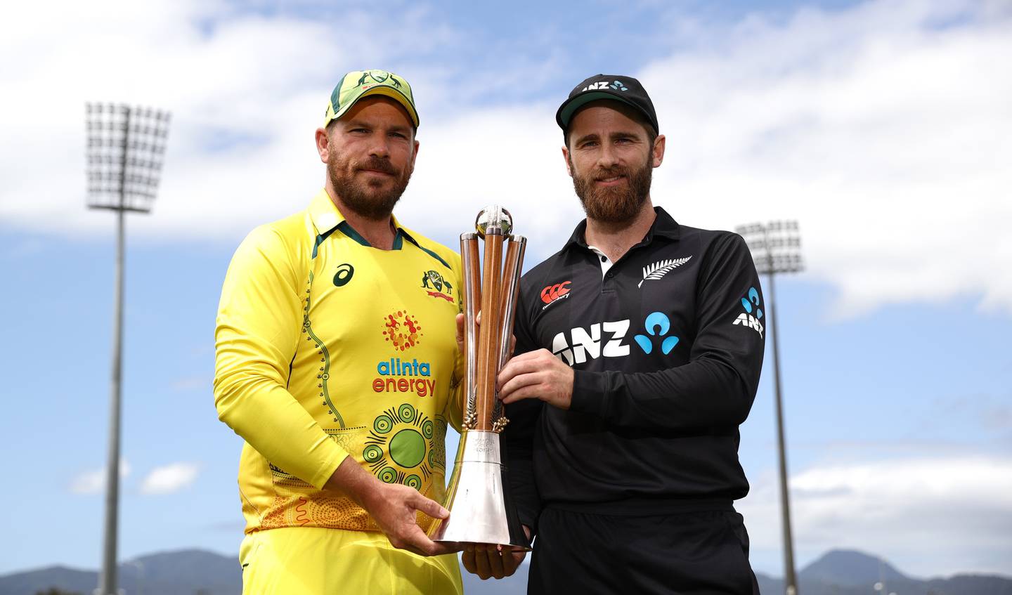 Australia captain Aaron Finch and Black Caps captain Kane Williamson pose with the Chappell-Hadlee Trophy. Photo / Getty