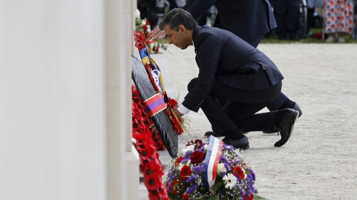 Britain's Prime Minister Rishi Sunak lays a wreath during a commemorative ceremony marking the 80th anniversary of the World War II D-Day" Allied landings in Normandy, at the World War II British Normandy Memorial of Ver-sur-Mer, Thursday, June 6, 2024. Photo / AP