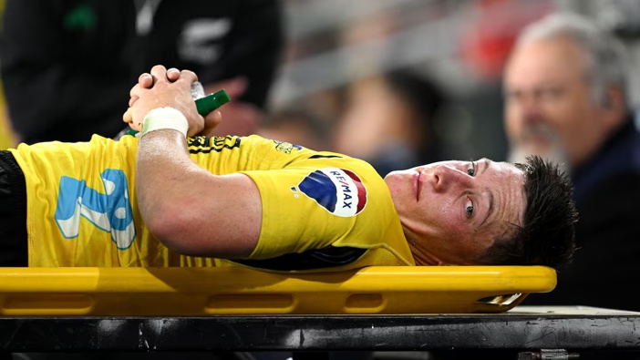 Cam Roigard leaves the field of play after sustaining an injury against the Highlanders. Photo / Getty Images