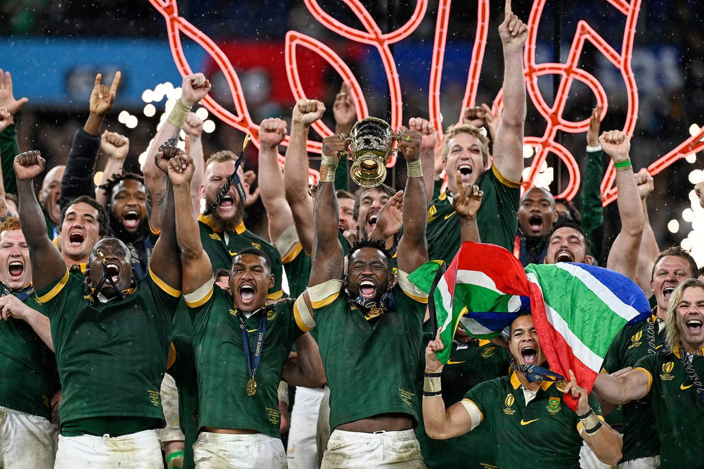 South Africa's Springboks celebrate winning this year's Rugby World Cup final against the All Blacks in France. Captain Siya Kolisi raises the Webb Ellis Cup. Photo / Photosport