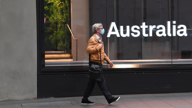 A pedestrian in Sydney's CBD on July 20, 2021. (Photo / Getty Images)
