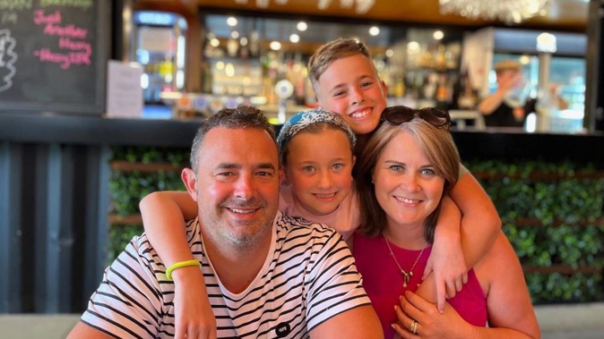 Matthew and Claire Child and their children. The couple are facing their second fight against cancer together. Photo / Supplied