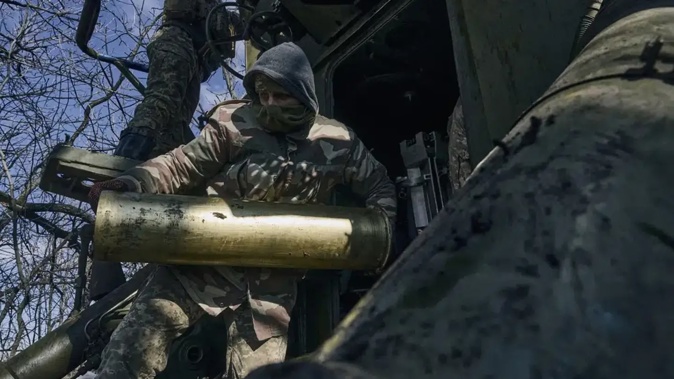 Ukrainian soldiers prepare to fire a self-propelled howitzer towards Russian positions near Bakhmut, Donetsk region, Ukraine. Photo / AP