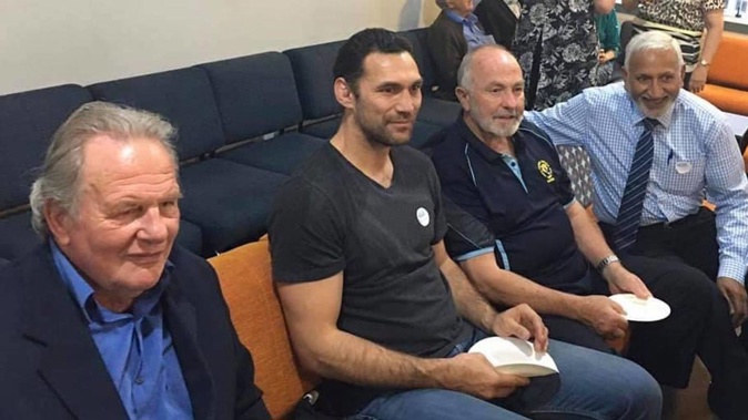 Peter Rasmussen (left) attending a ceremony at Ōtāhuhu College for a presentation to Graham Lowe. Photo / Supplied