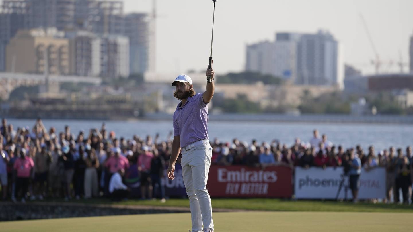 Tommy Fleetwood celebrates after he won the final round of Dubai Invitational golf tournament. Photo / AP
