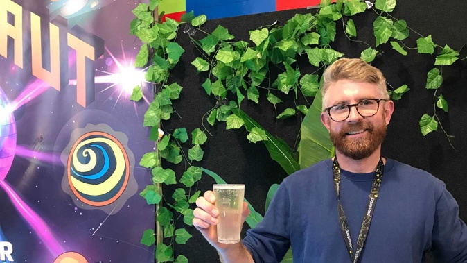 Urbanaut head brewer Bruce Turner with New Zealand's first clear beer. (Photo / Sophie Trigger)