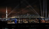 A laser light show incorporating the Auckland Harbour Bridge. Photo / Dean Purcell