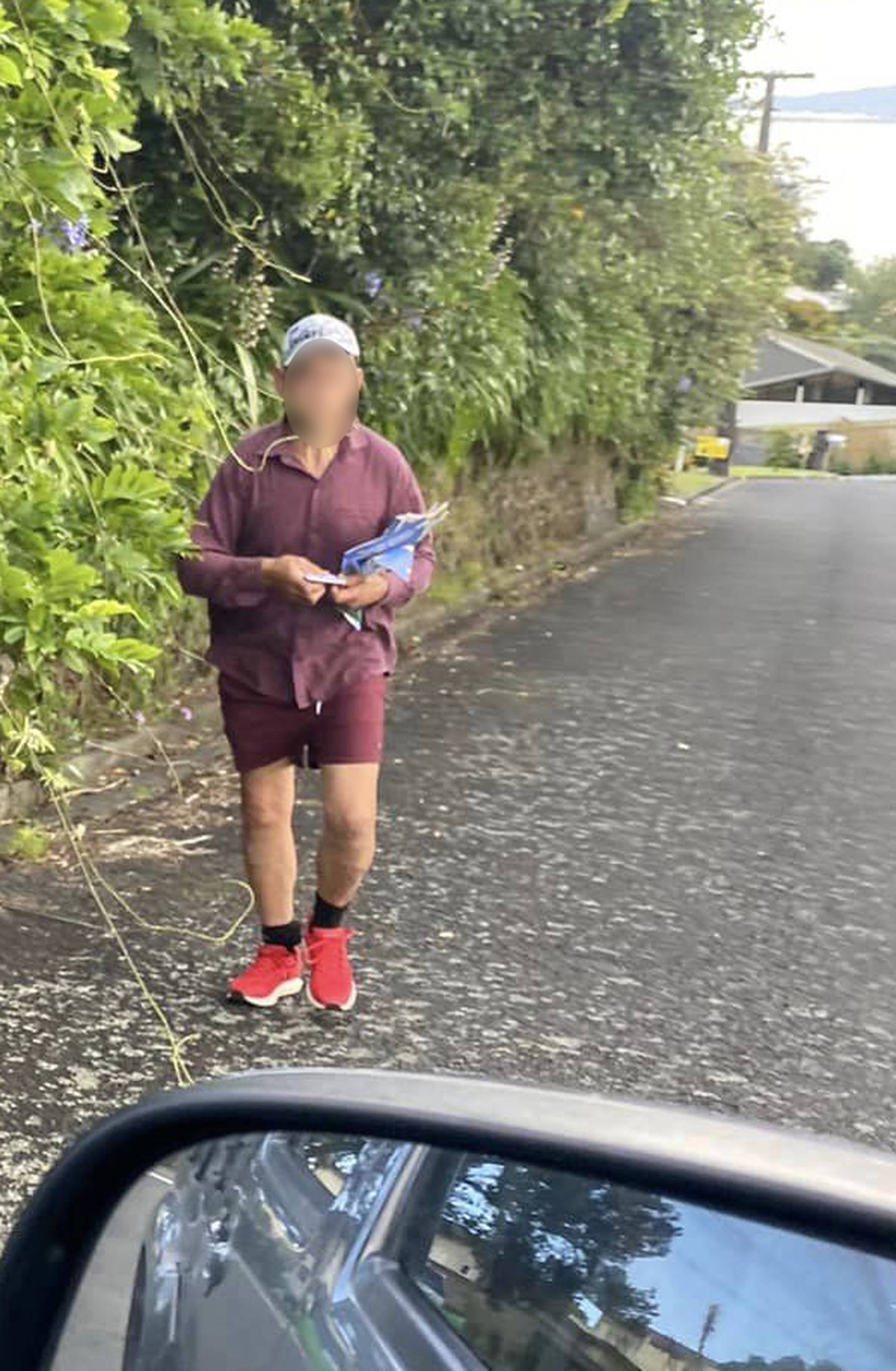 The man did not fit the profile of a Property Press contractor - and was delivering on the wrong day. Photo / Supplied