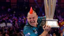 Tears and jeers mark dramatic world darts champs final
