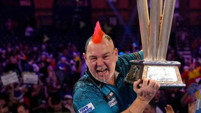 Peter Wright celebrates his second World Darts Championship title. Photo / Getty