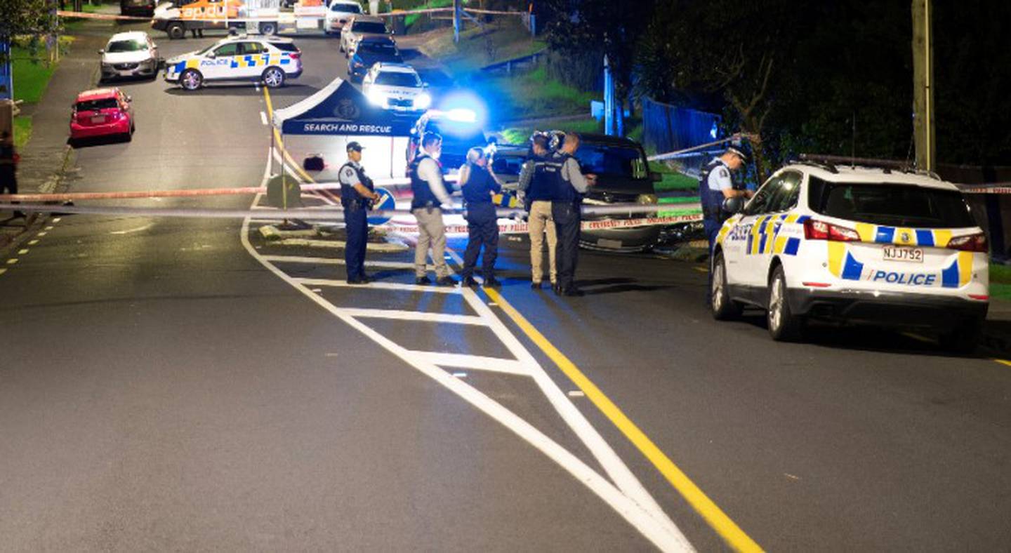 The scene on Beach Haven Rd on Auckland's North Shore on Friday. Photo / Hayden Woodward