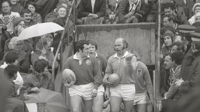 British Lions vs Northland, Whangarei 1977: Opposing captains Phil Bennett (left) and Sid Going lead their sides out onto Okara Park. Photo / Northern Advocate