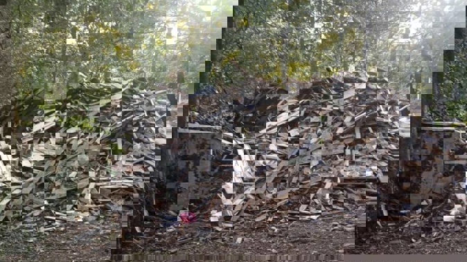 Susan Hodgson's mistakenly demolished family home sits in a pile of lumber and debris in southwest Atlanta, Georgia. Photo / AP