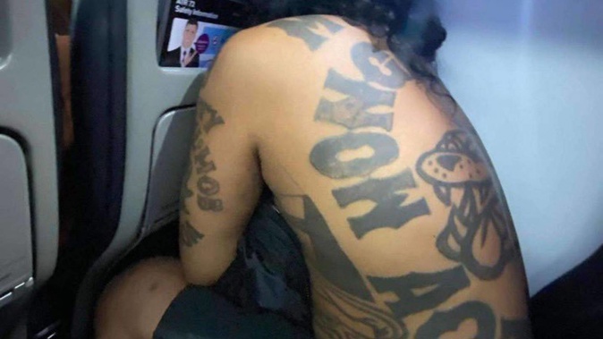 Winston Peters, in a tweet on Thursday evening, has revealed photos of a man who appears to be wanted man Hendrix Rawiri Jury on a domestic flight. Photo / Winston Peters
