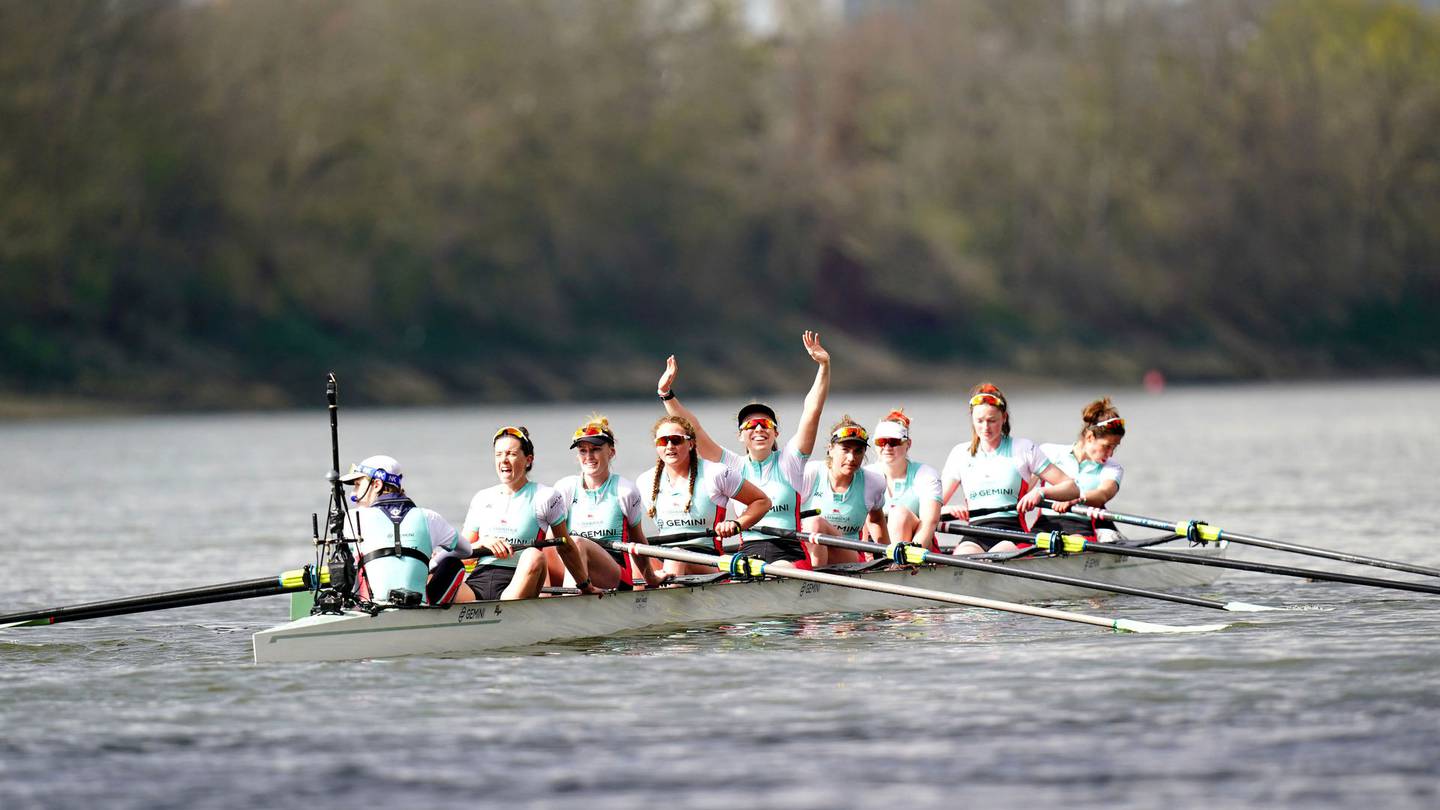 Cambridge celebrate winning during the 76th Women's Boat Race on the River Thames. (Photo / AP)
