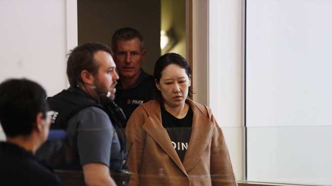 Hakyung Lee, the woman accused of murdering her two children and dumping them in a storage unit, in the Manukau District Court. Photo / Dean Purcell