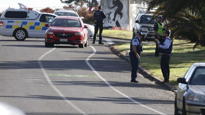 There was a heavy police presence in Peter Snell Drive in Ruakākā after two bodies were found at a house. Photo / Michael Cunningham