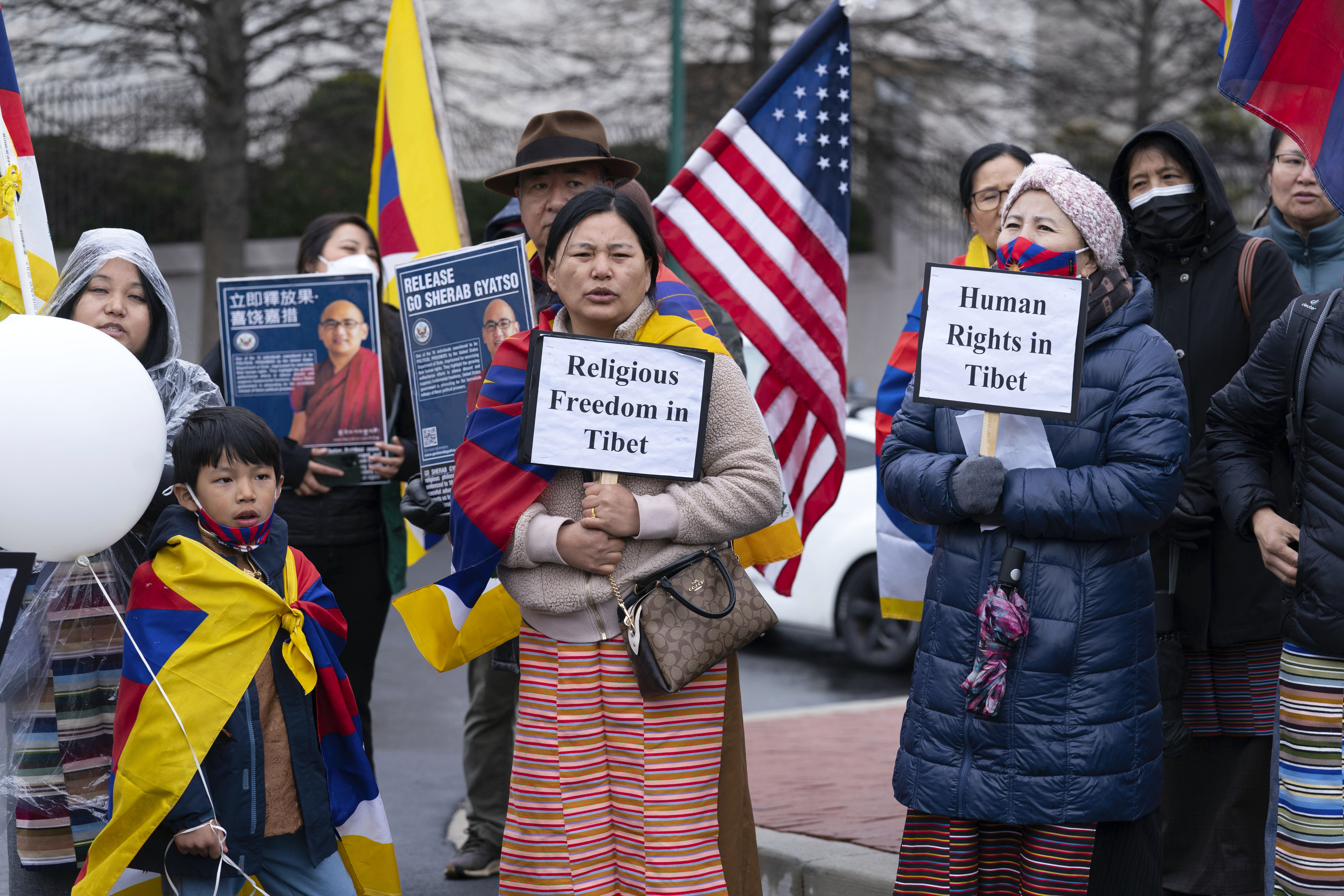 Demonstrators hold signs during a rally to commemorate the failed 1959 Tibetan uprising against China's rule, outside of the Chinese Embassy in Washington, Friday, March 10, 2023. The gathering took place on what is known as Tibetan National Uprising Day. Photo / AP