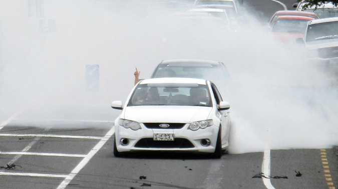 Michael Tucker was charged under 2009 boy racer legislation, which made it an offence to perform burnouts, following a police sting in Whanganui during the weekend. Photo / NZME