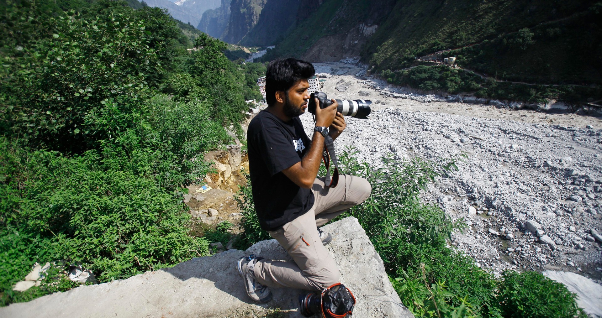 Reuters photographer Danish Siddiqui covers the monsoon floods and landslides in the upper reaches of Govindghat, India. (Photo / AP)