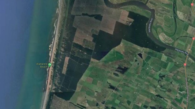 The woman's body was found in the water at Waitārere Beach. Photo / Google Maps