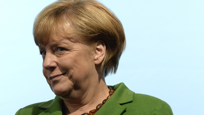 John Key has reassured his German counterpart, Angela Merkel, following revelations she was spied on by the United States (Getty Images)