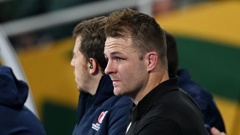 Sam Cane sits on the bench after receiving a red card in the Rugby World Cup final. Photo / Getty Images.
