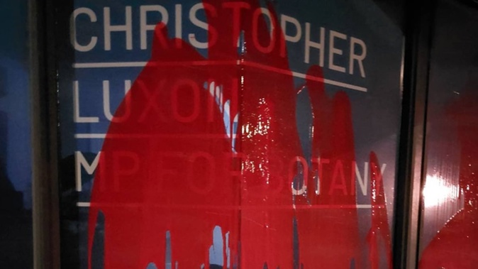 Christopher Luxon's Botany electorate office was splashed with red paint overnight by Tāmaki for Palestine protesters.