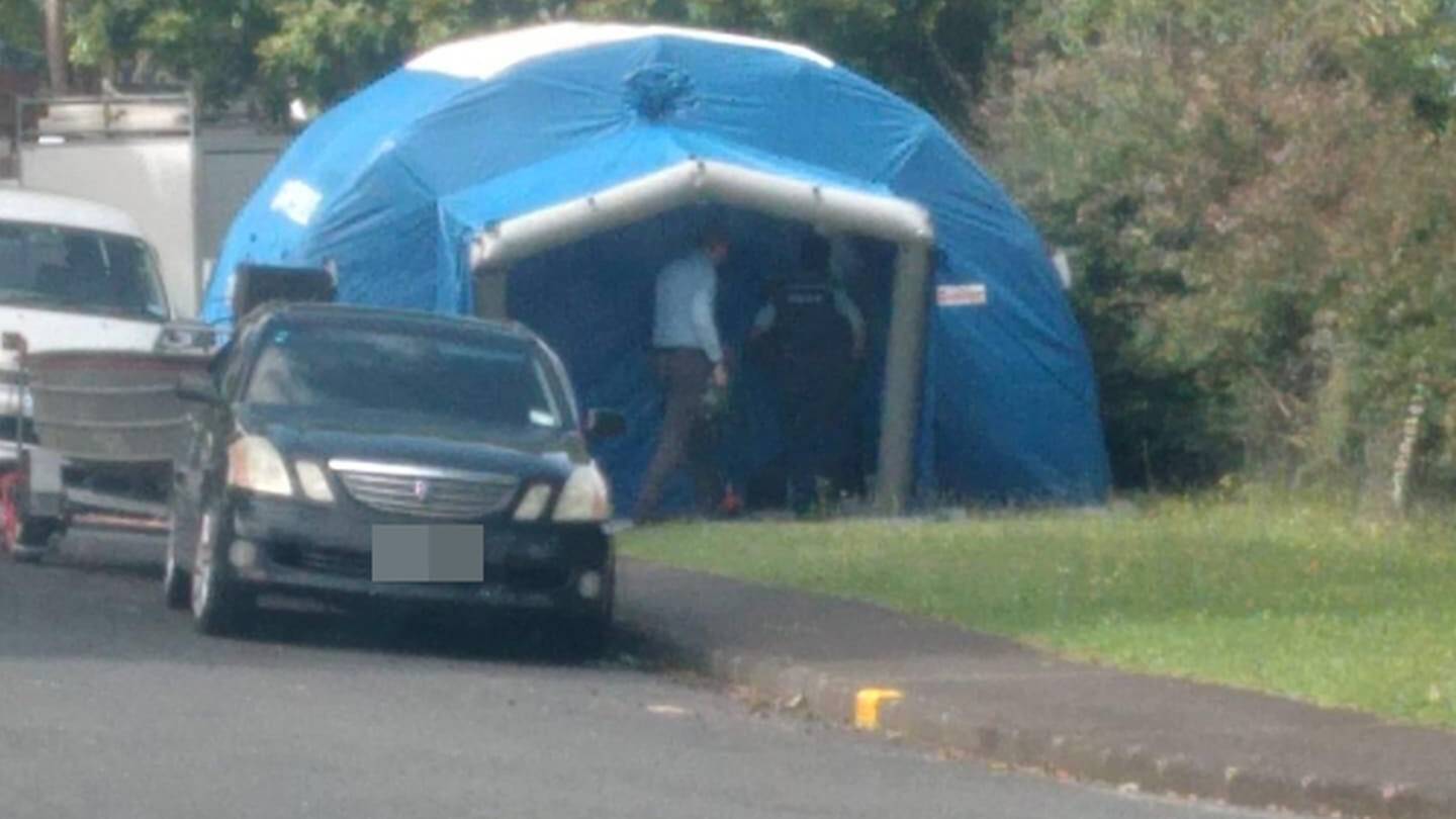 Police have set up a tent outside properties on Vandeleur Avenue in Birkdale after a baby was taken to Starship Hospital suffering critical injuries.