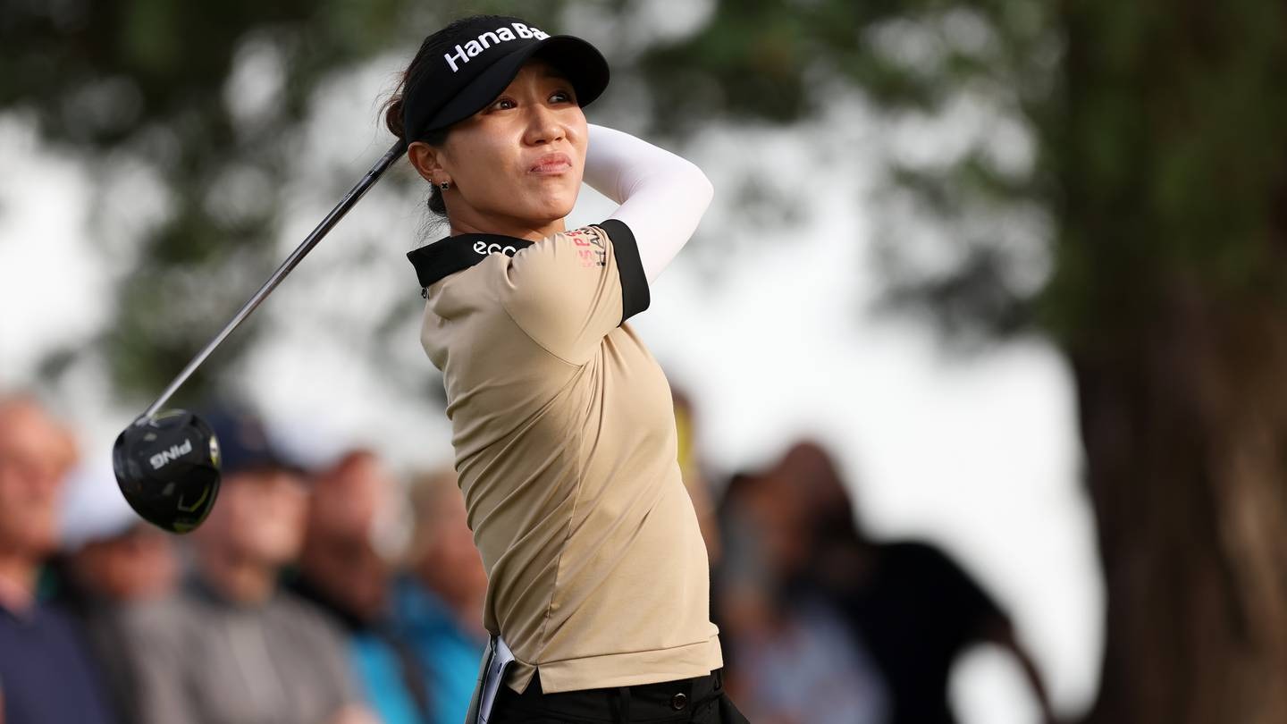 Lydia Ko tees off on the 18th hole at Walton Heath Golf Club. Photo / Getty