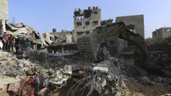 Palestinians inspect the damage of destroyed houses after Israeli airstrikes on Gaza City, Tuesday, Oct. 24, 2023. Photo / AP