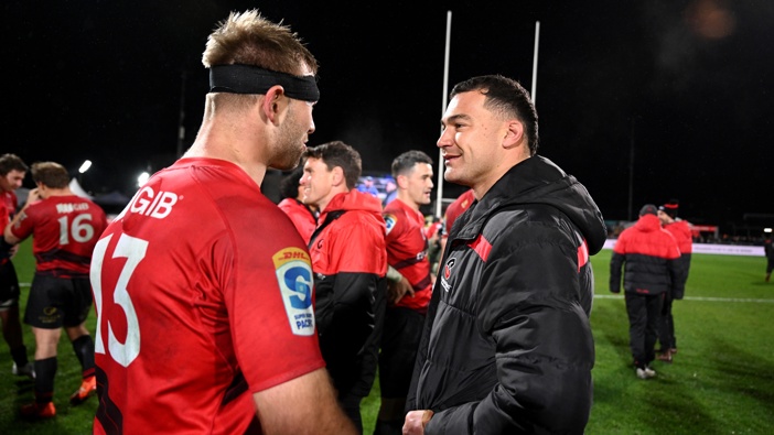 David Havili of the Crusaders and Braydon Ennor of the Crusaders celebrate after winning the Super Rugby Pacific Semi Final match between Crusaders and Blues at Apollo Projects Stadium, on June 13, 2025, in Christchurch, New Zealand. (Photo by Joe Allison/Getty Images)