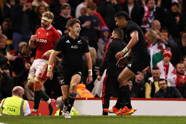 Beauden Barrett of New Zealand celebrates scoring his sides sixth try during the Autumn International match between Wales and New Zealand. (Photo / Getty Images.)