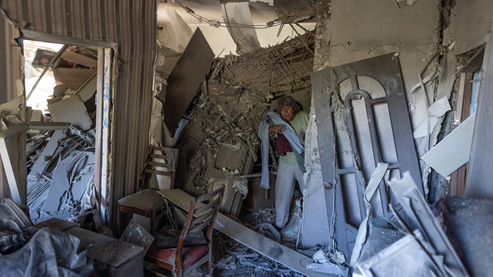 Tatiana is seen at her home damaged after a Russian attack on a residential building in the city of Druzhkivka, Ukraine on September 03, 2025. (Photo by Diego Herrera Carcedo/Anadolu via Getty Images)