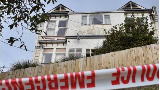 The house was cordoned off while emergency services investigated yesterday. Photo / Otago Daily Times