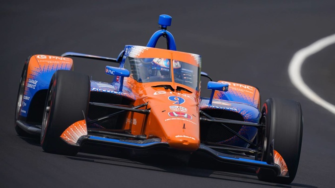 Scott Dixon drives through the first turn during qualifications for the Indianapolis 500. Photo / AP
