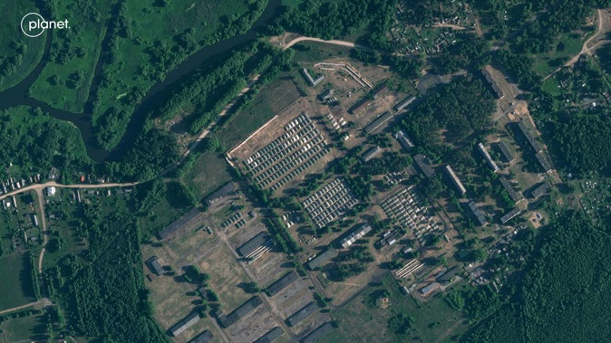 An apparent recent construction of tents at a former military base outside the Belarusian town of Osipovichi. Photo / AP