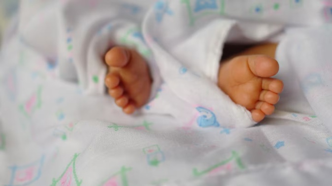 A teen has been sentenced at the New Plymouth District Court for breaking his newborn son's ribs and bruising his face and body. Photo / 123rf