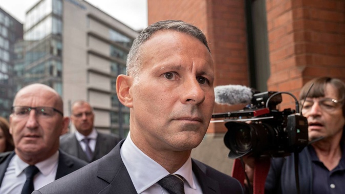 Former Manchester United star Ryan Giggs arrives at Manchester Minshull Street Crown Court. Photo / AP