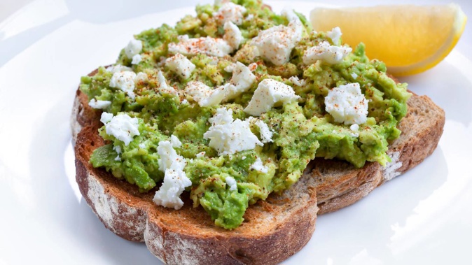 One Auckland townhouse has sold with a year's supply of avocado on toast thrown in. (Photo / 123rf)
