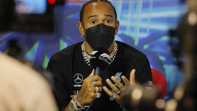 Lewis Hamilton was seen wearing at least three watches with four rings on each hand on Saturday in Miami. (Photo / Getty)