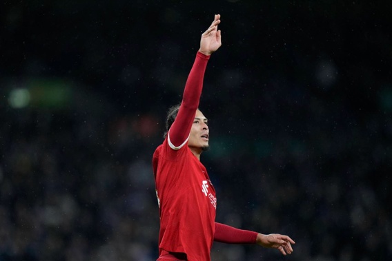 Liverpool's Virgil van Dijk celebrates after scoring his side's winning goal against Chelsea during the English League Cup final. Photo / AP
