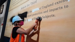A protest at Te Papa Museum involving spray paint and the defacement of text using an angle grinder on the Treaty of Waitangi exhibition. Photo / Supplied