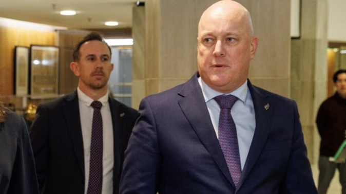 Prime Minister Christopher Luxon and former press secretary Michael Forbes (left). Photo / Mark Mitchell