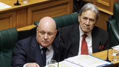 Prime Minister Christopher Luxon (left) is expected to shortly speak with media. Photo / Mark Mitchell.