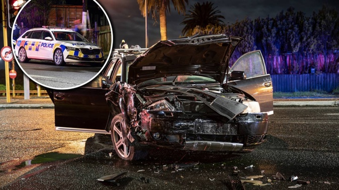 A fleeing driver crashed into another driver and injured them in west Auckland last night. Photo / Hayden Woodward